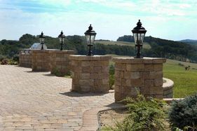 Photo of hardscaped pathway with lamps