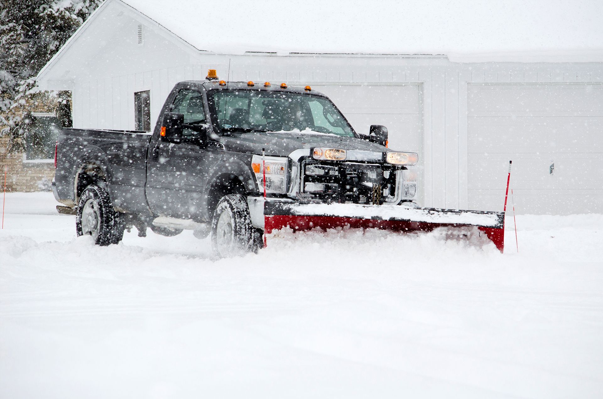 Photo of truck plowing snow